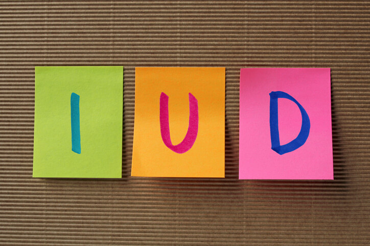 IUD acronym on colorful sticky notes