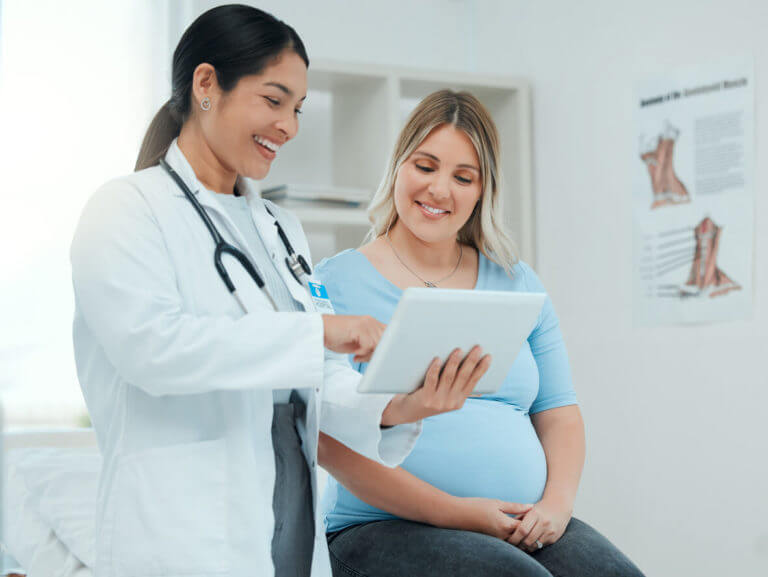 Shot of a doctor during a consultation with a pregnant patient in a clinic